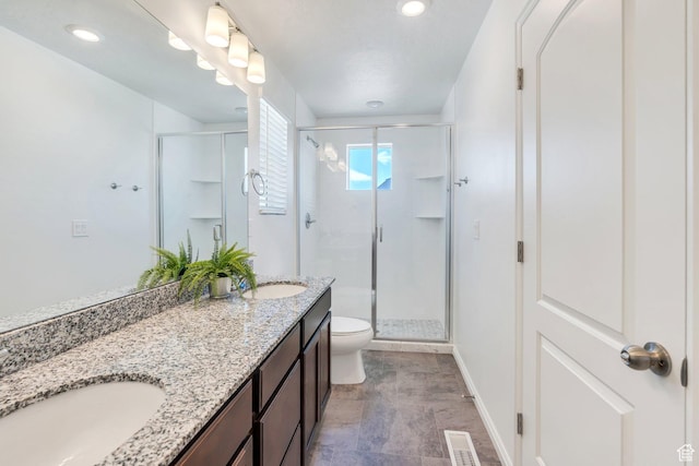 97 E Polaris Dr S Unit 394, Saratoga Springs, UT 84045 - bathroom featuring a stall shower, double vanity, toilet, baseboards, and recessed lighting