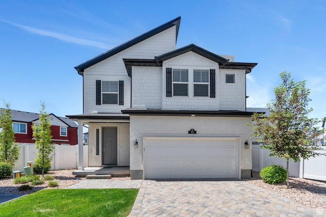 97 E Polaris Dr S Unit 394, Saratoga Springs, UT 84045 - traditional-style house with a garage, driveway, and stucco siding