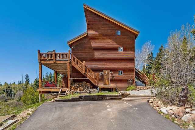 2620 Crow Loop, Coalville, UT 84017 - view of home's exterior with stairs and a deck