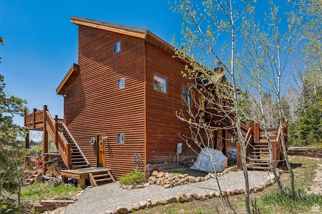 2620 Crow Loop, Coalville, UT 84017 - view of property exterior with stairs and a deck
