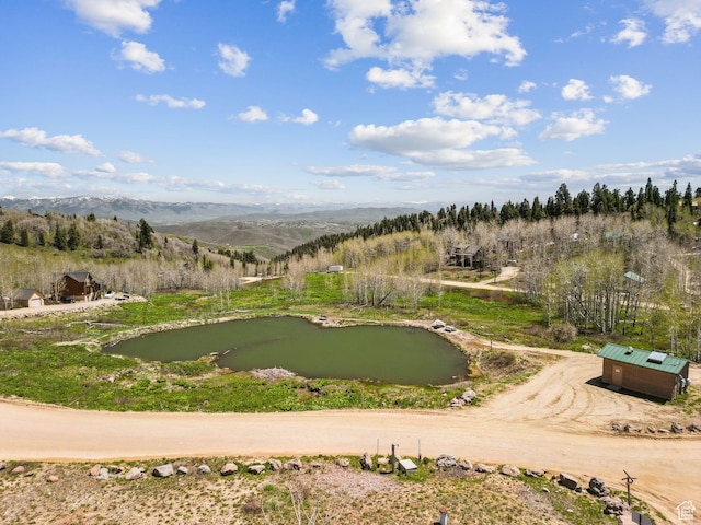 2620 Crow Loop, Coalville, UT 84017 - view of property's community with an area to practice putting and a water and mountain view