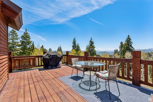 2620 Crow Loop, Coalville, UT 84017 - wooden deck featuring outdoor dining space, a mountain view, and area for grilling