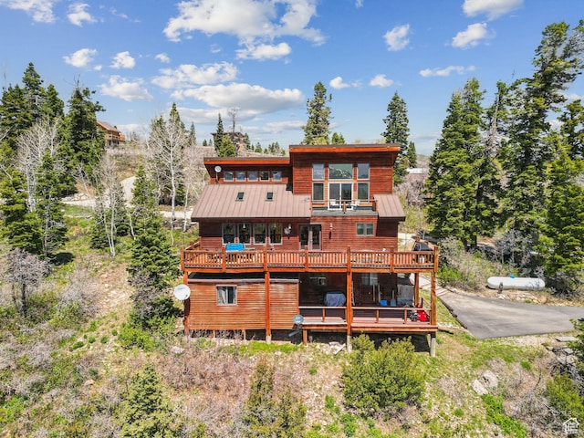 2620 Crow Loop, Coalville, UT 84017 - rear view of property with a standing seam roof, a balcony, metal roof, and a deck