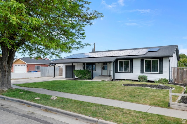 4112 W 5085 S, Kearns, UT 84118 - single story home featuring an attached garage, solar panels, a porch, and concrete driveway