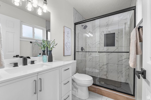 4112 W 5085 S, Kearns, UT 84118 - full bathroom with marble finish floors, vanity, toilet, a marble finish shower, and a textured ceiling