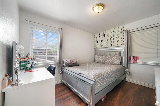 705 N American Beauty Dr, Salt Lake City, UT 84116 - bedroom featuring wood finished floors and baseboards