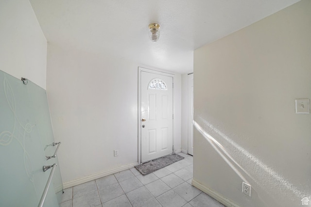 705 N American Beauty Dr, Salt Lake City, UT 84116 - foyer entrance with baseboards and light tile patterned flooring