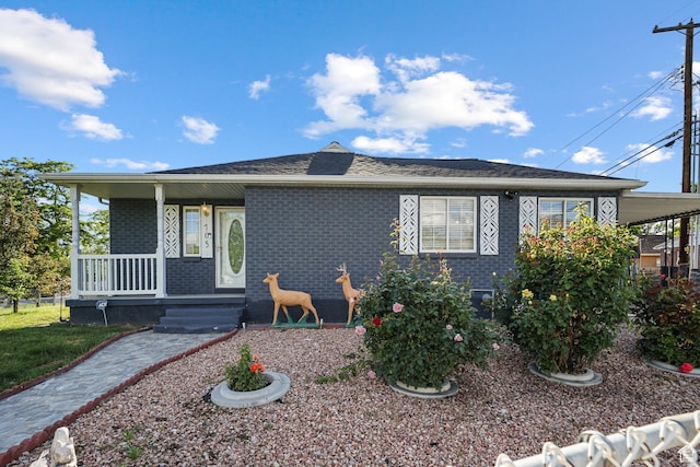 705 N American Beauty Dr, Salt Lake City, UT 84116 - view of front of house with covered porch and brick siding