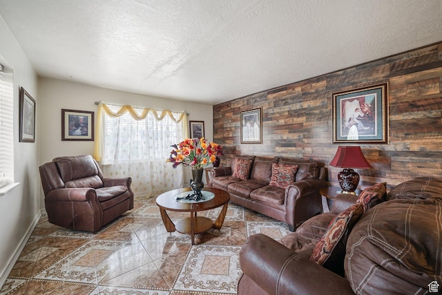 705 N American Beauty Dr, Salt Lake City, UT 84116 - living area with baseboards, a textured ceiling, wooden walls, and inlaid floor details