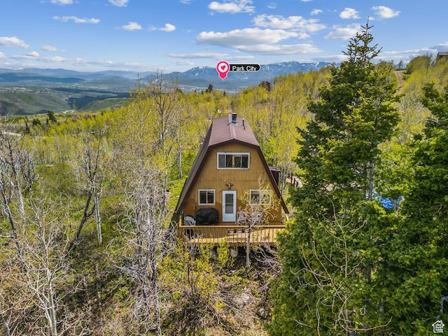 2422 S Valley View Cir, Coalville, UT 84017 - view of front of property with a deck with mountain view