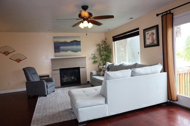5208 W Case Rd, West Jordan, UT 84081 - living room with healthy amount of natural light, a ceiling fan, and dark wood-style flooring