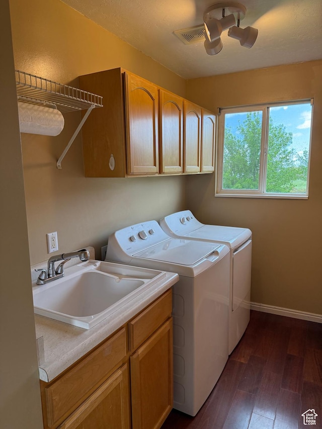 5208 W Case Rd, West Jordan, UT 84081 - washroom with cabinet space, washing machine and dryer, dark wood finished floors, a ceiling fan, and baseboards