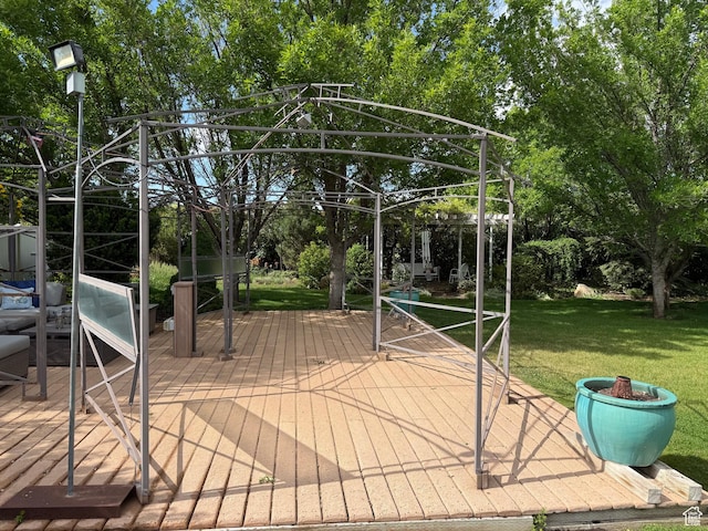 5208 W Case Rd, West Jordan, UT 84081 - wooden terrace featuring a lawn and view of wooded area