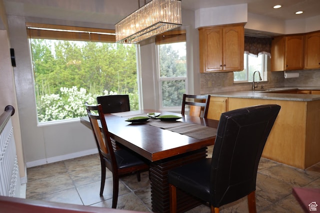 5208 W Case Rd, West Jordan, UT 84081 - dining area featuring baseboards and recessed lighting