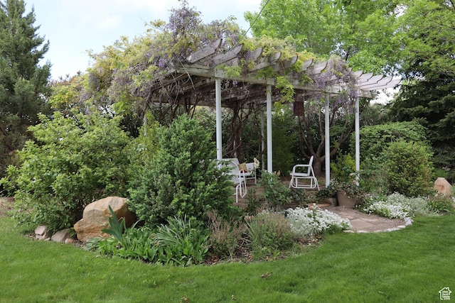 5208 W Case Rd, West Jordan, UT 84081 - view of green lawn featuring a pergola and a patio area
