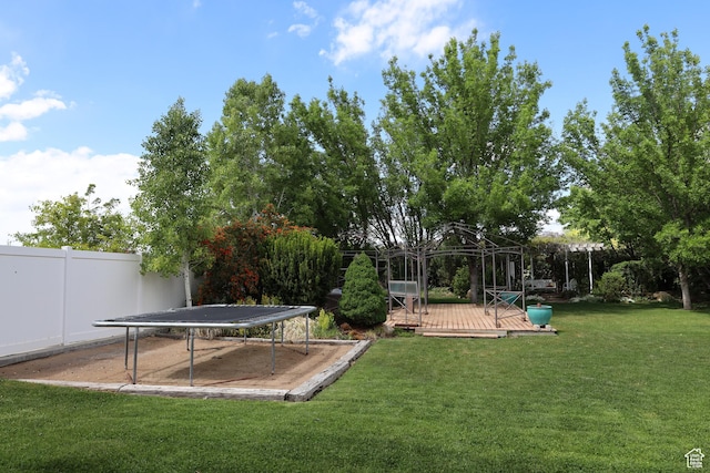 5208 W Case Rd, West Jordan, UT 84081 - view of yard with a deck and a trampoline