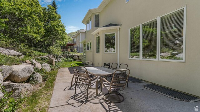 3343 E Stone Mountain Ln, Sandy, UT 84092 - view of patio with outdoor dining area