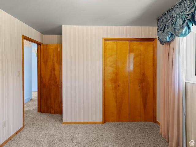 235 E 800 N Unit 2, Tremonton, UT 84337 - unfurnished bedroom featuring carpet, baseboards, and a closet