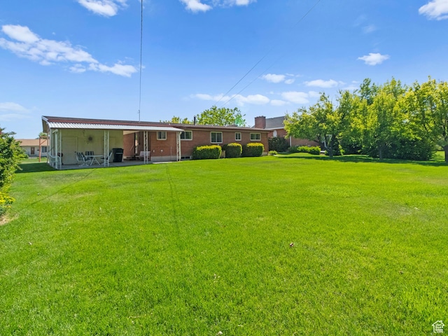 235 E 800 N Unit 2, Tremonton, UT 84337 - view of grassy yard featuring a patio area