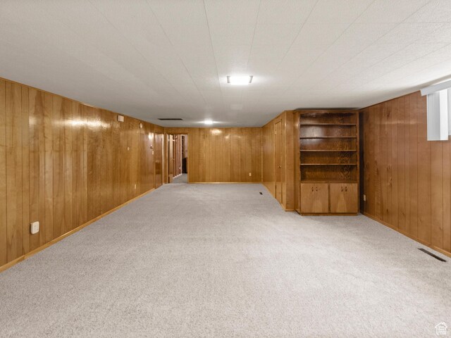 235 E 800 N Unit 2, Tremonton, UT 84337 - basement with wood walls and carpet flooring