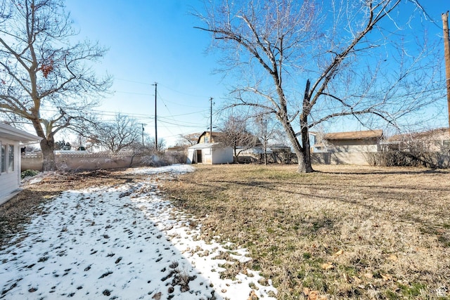 2054 W Mark St, Layton, UT 84041 - yard covered in snow featuring a fenced backyard