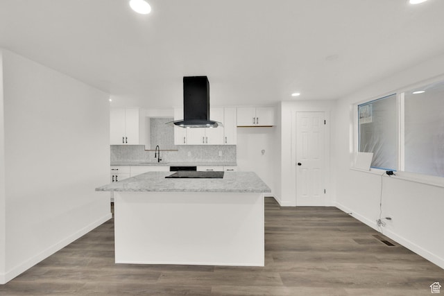 2054 W Mark St, Layton, UT 84041 - kitchen featuring extractor fan, recessed lighting, white cabinets, a sink, and baseboards