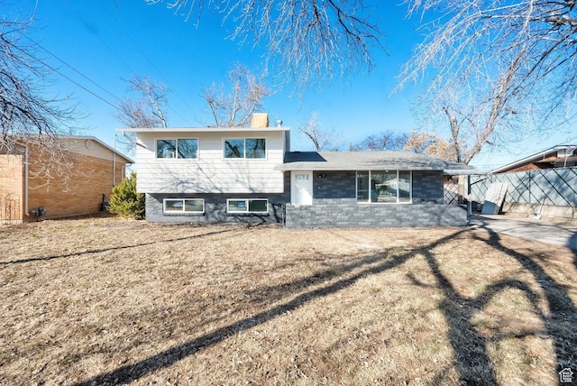 2054 W Mark St, Layton, UT 84041 - back of house featuring a chimney