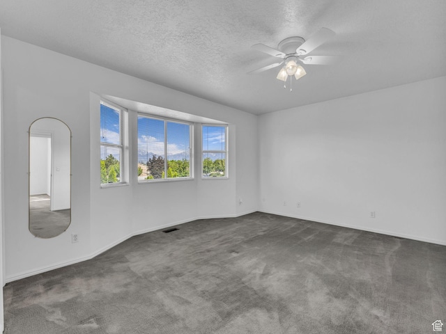 4853 W Ticklegrass Rd, West Jordan, UT 84081 - empty room with carpet flooring, ceiling fan, baseboards, and a textured ceiling