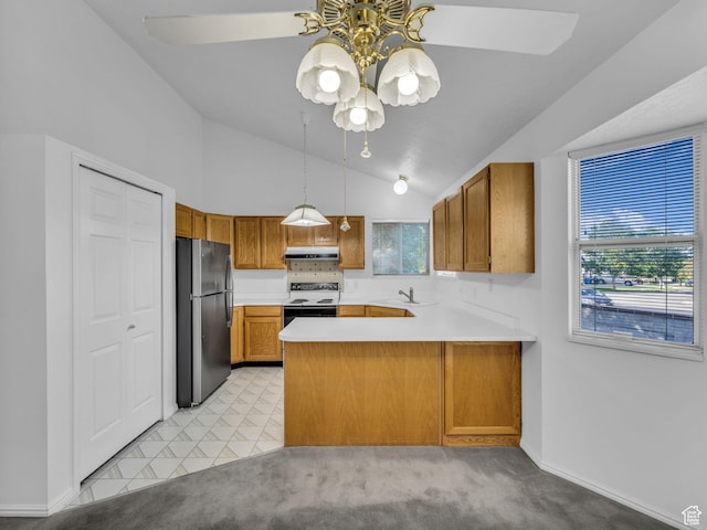 4853 W Ticklegrass Rd, West Jordan, UT 84081 - kitchen with freestanding refrigerator, range with electric cooktop, a chandelier, a sink, and brown cabinetry