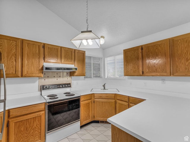 4853 W Ticklegrass Rd, West Jordan, UT 84081 - kitchen with electric range, a sink, under cabinet range hood, lofted ceiling, and light countertops