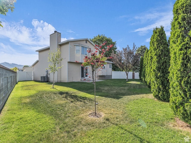 4853 W Ticklegrass Rd, West Jordan, UT 84081 - view of yard featuring central AC unit