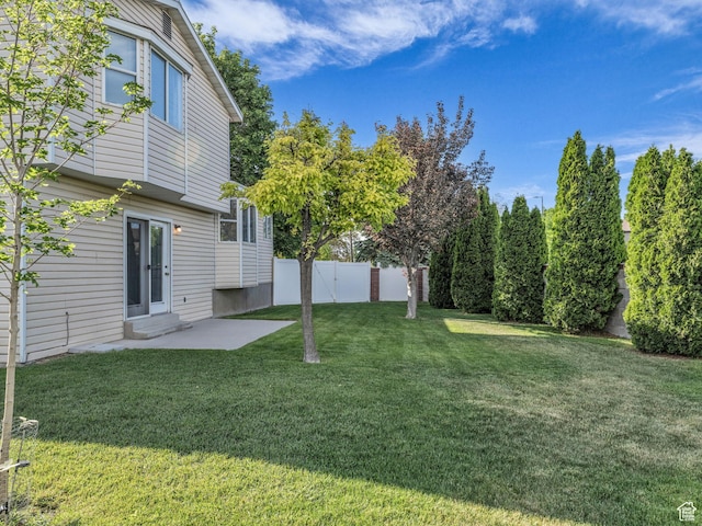 4853 W Ticklegrass Rd, West Jordan, UT 84081 - view of yard featuring a patio