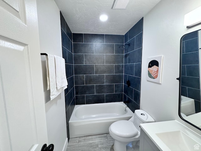 5135 W 4170 S, West Valley City, UT 84120 - bathroom featuring toilet, vanity, bathing tub / shower combination, and a textured ceiling