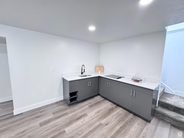 5135 W 4170 S, West Valley City, UT 84120 - kitchen with a sink, gray cabinetry, light wood-type flooring, light countertops, and recessed lighting