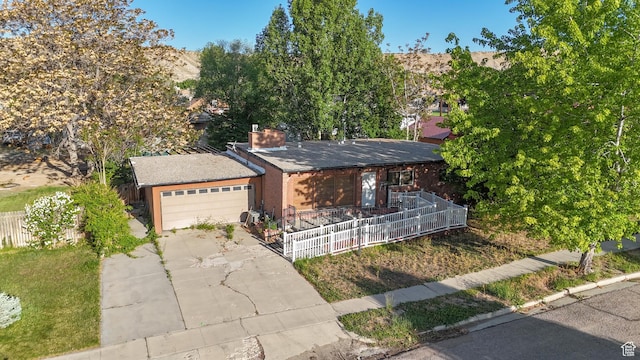 775 N 500 E, Price, UT 84501 - single story home featuring concrete driveway, a garage, a chimney, and a porch