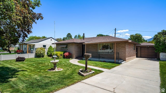374 N 500 E, Spanish Fork, UT 84660 - view of front facade with a porch, brick siding, and driveway