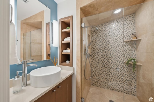 2067 E Pheasant Cir, Holladay, UT 84121 - full bathroom featuring vanity, a shower stall, and built in shelves