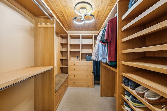 2067 E Pheasant Cir, Holladay, UT 84121 - walk in closet featuring light colored carpet and a chandelier