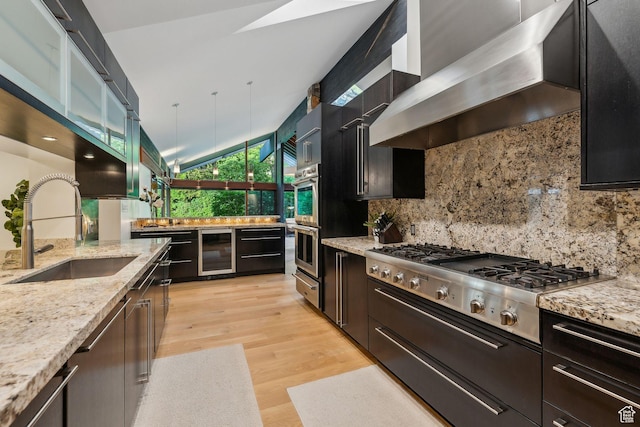 2067 E Pheasant Cir, Holladay, UT 84121 - kitchen with wall chimney range hood, beverage cooler, a sink, stainless steel appliances, and decorative backsplash