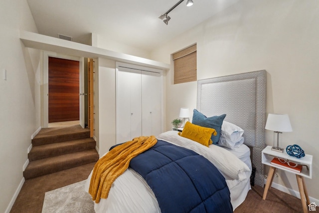 2067 E Pheasant Cir, Holladay, UT 84121 - bedroom featuring baseboards, a closet, and carpet floors