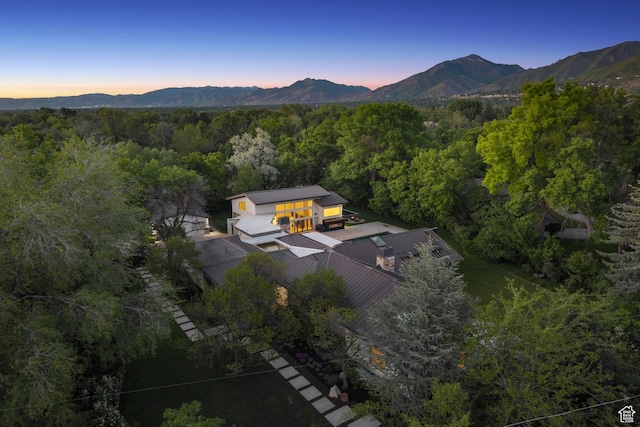 2067 E Pheasant Cir, Holladay, UT 84121 - aerial view of property and surrounding area with a forest and a mountain backdrop