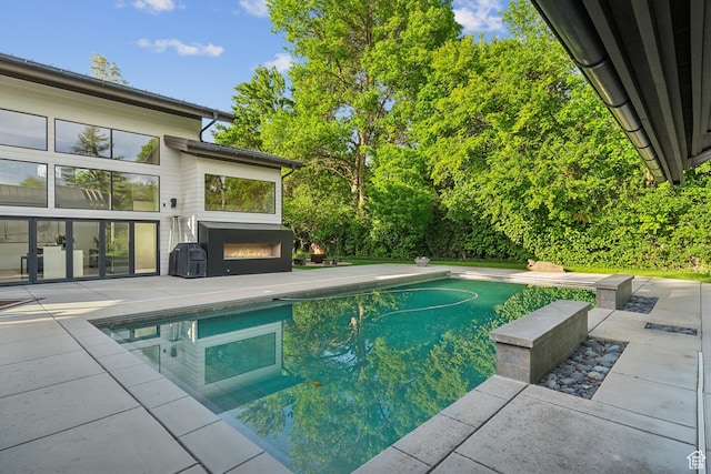 2067 E Pheasant Cir, Holladay, UT 84121 - outdoor pool featuring a patio