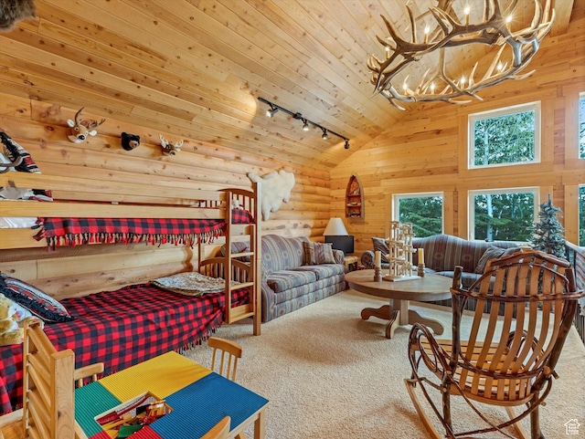 9281 N Uinta Dr, Oakley, UT 84055 - bedroom featuring rail lighting, carpet, vaulted ceiling, a chandelier, and wooden ceiling