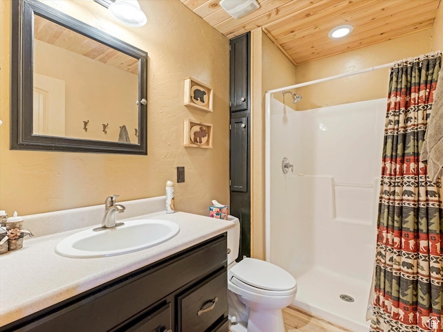 9281 N Uinta Dr, Oakley, UT 84055 - full bath with wooden ceiling, a textured wall, a stall shower, vanity, and toilet