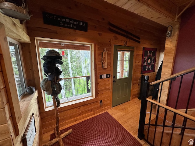 9281 N Uinta Dr Unit 348, Oakley, UT 84055 - entryway featuring wood walls, light wood finished floors, and stairs