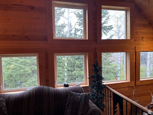 9281 N Uinta Dr Unit 348, Oakley, UT 84055 - living area featuring wood walls and a high ceiling