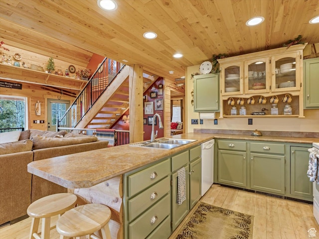 9281 N Uinta Dr, Oakley, UT 84055 - kitchen with green cabinetry, a sink, a peninsula, wooden ceiling, and dishwasher