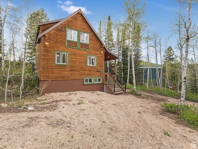 9281 N Uinta Dr, Oakley, UT 84055 - back of house with stairs