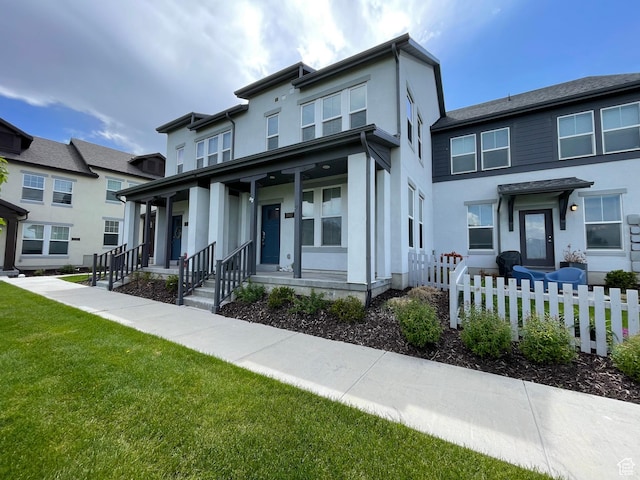 5957 W Lake Ave, South Jordan, UT 84009 - view of front of house with covered porch and stucco siding