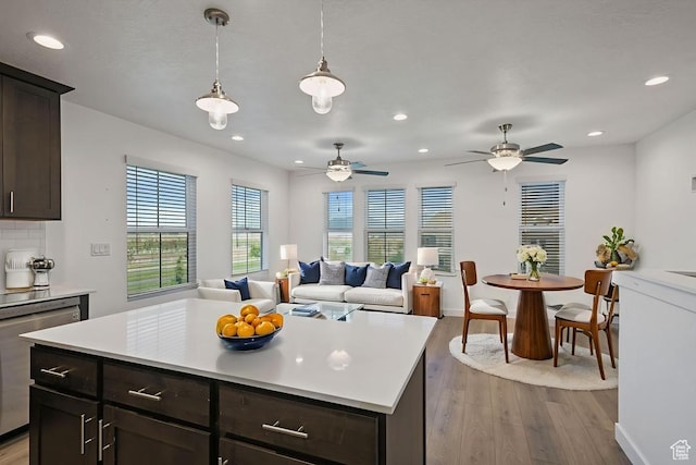 5957 W Lake Ave, South Jordan, UT 84009 - kitchen with wood finished floors, recessed lighting, light countertops, dishwasher, and a ceiling fan